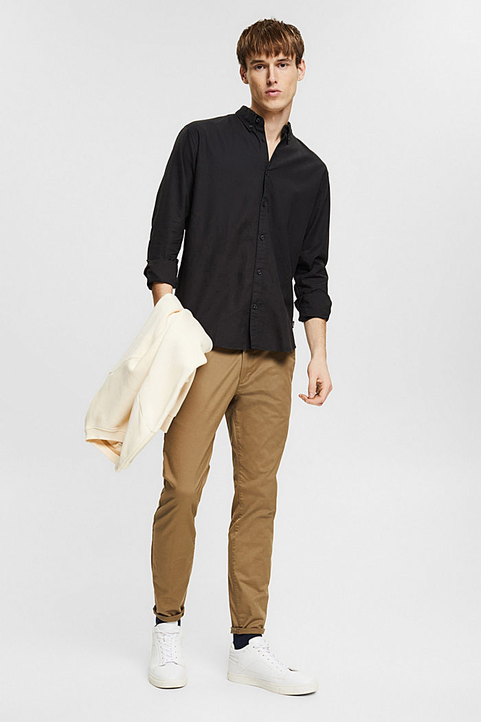 Top with a button-down collar