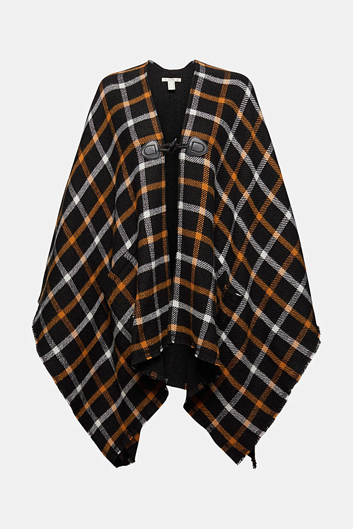 Checked poncho with a toggle fastener