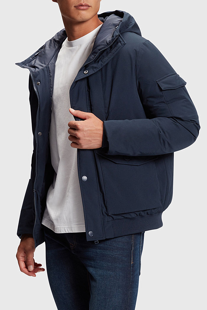Down jacket with flap pockets