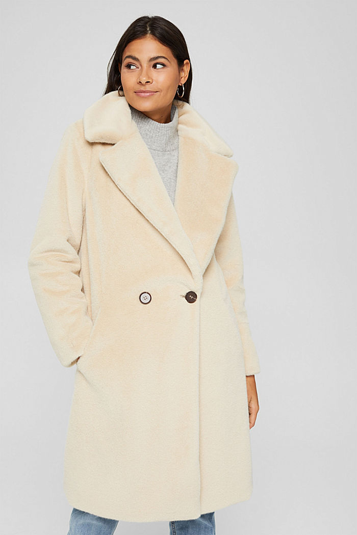 Coat with a wide lapel made of faux fur
