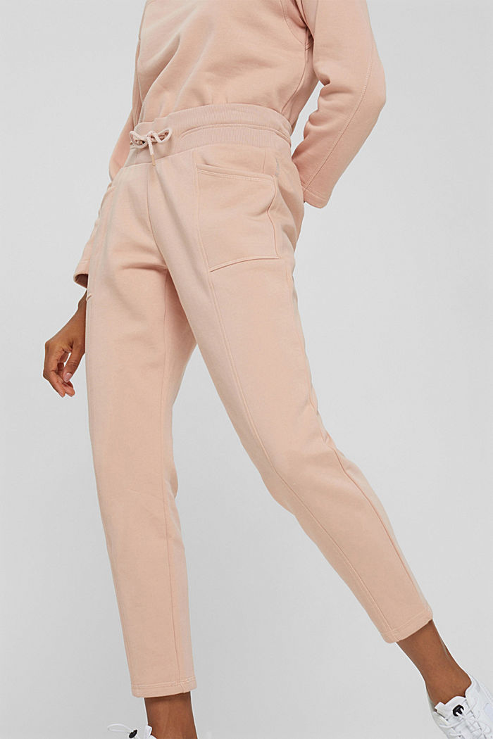 Tracksuit bottoms with pockets, organic cotton blend, NUDE, overview