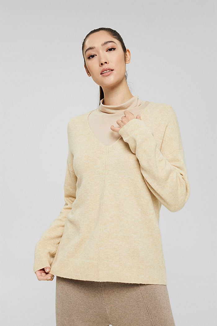 Con lana: pullover con scollo a V